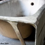 old, heavy, cast iron bath tub saved for reuse reuse-04